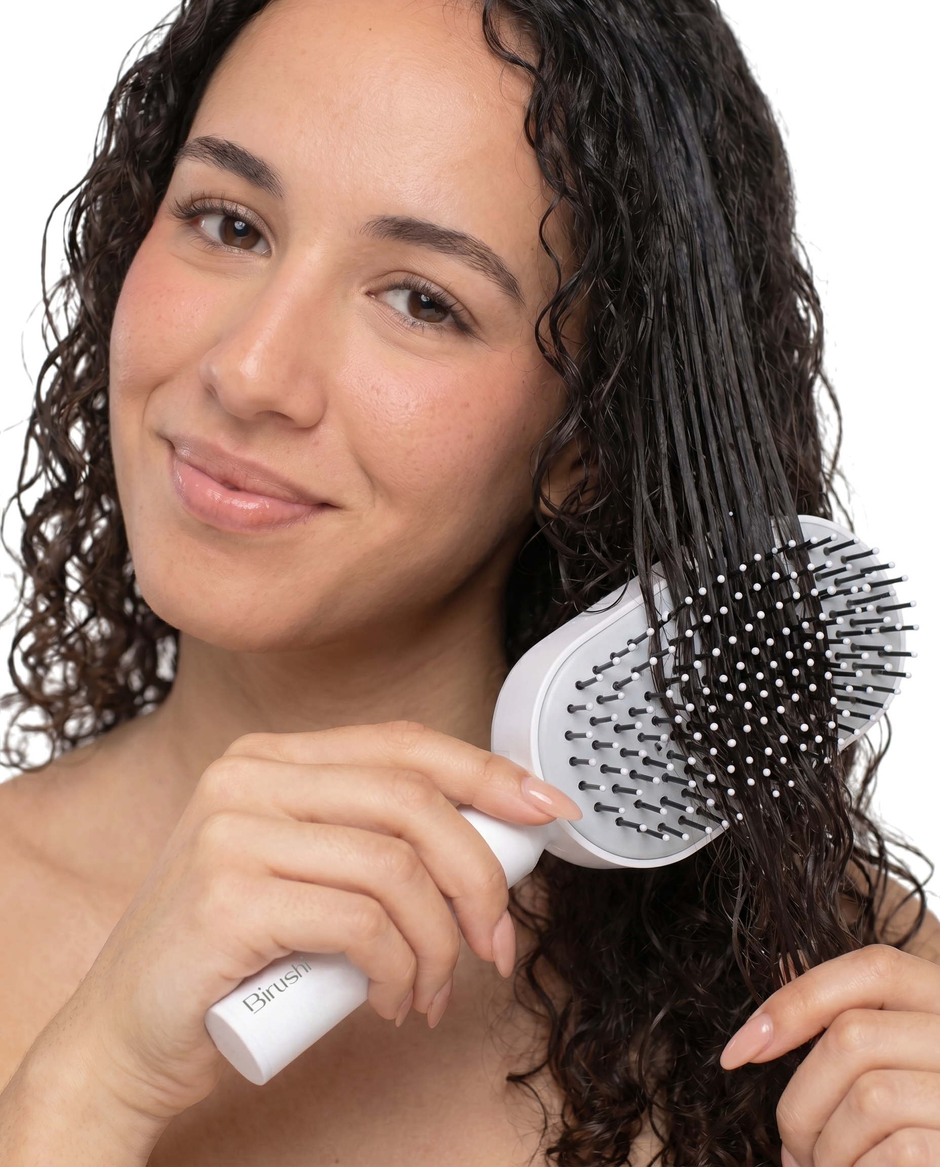 Brosser ses cheveux bouclés avec la brosse Birushi