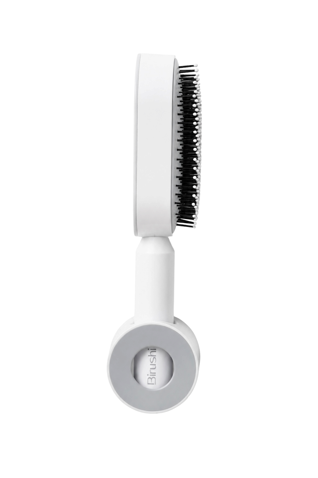Brosse Birushi rangée sur son support mural